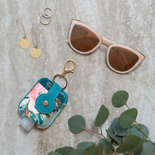 Load image into Gallery viewer, Orange Circle Studio Bella Flora Hand-Sanitizer Holder With Travel Bottle  by Studio Oh!
